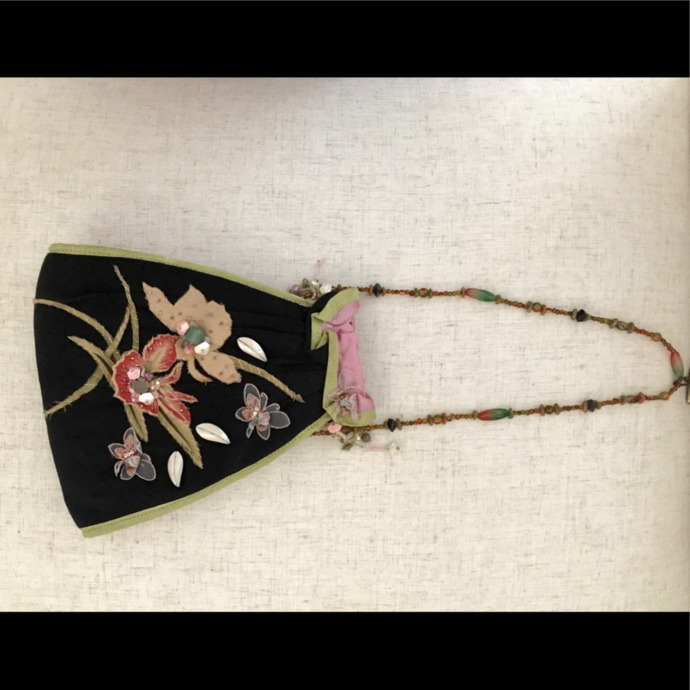 Embellished floral evening purse.